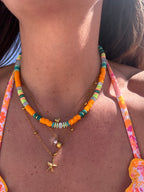 Collier Papaye perles heishi orange vif
